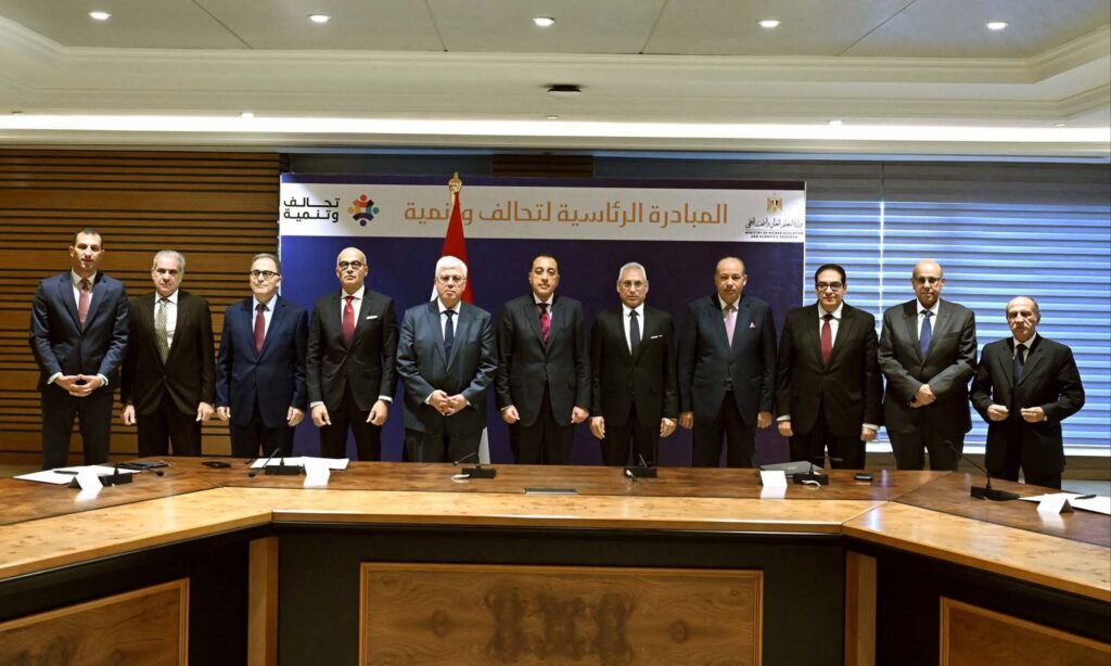 fb_img_17654491391121870012525827157614-1024x614 خلال حضوره الجمعيـة العامة للشراكة بين الأكاديميات نيابة عن فخامة الرئيس:رئيس الوزراء يشهد مراسم توقيع البروتوكولات التنفيذية للتحالفات التسعة المتأهلة للمرحلة النهائية من المبادرة الرئاسية "تحالف وتنمية"