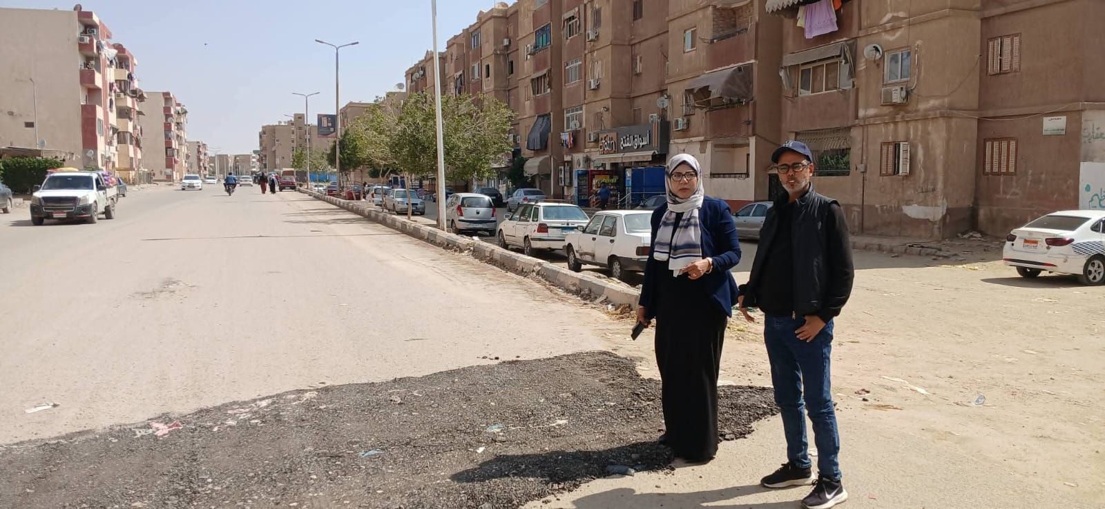 حي فيصل بالسويس يقوم بتحسين جودة الطرق وتيسير حركة المرور