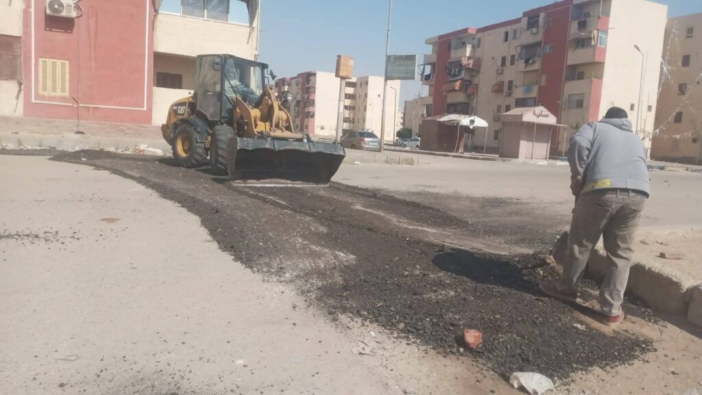 img-20260407-wa00944159382222031135954-1024x576 حي فيصل بالسويس يقوم بتحسين جودة الطرق وتيسير حركة المرور