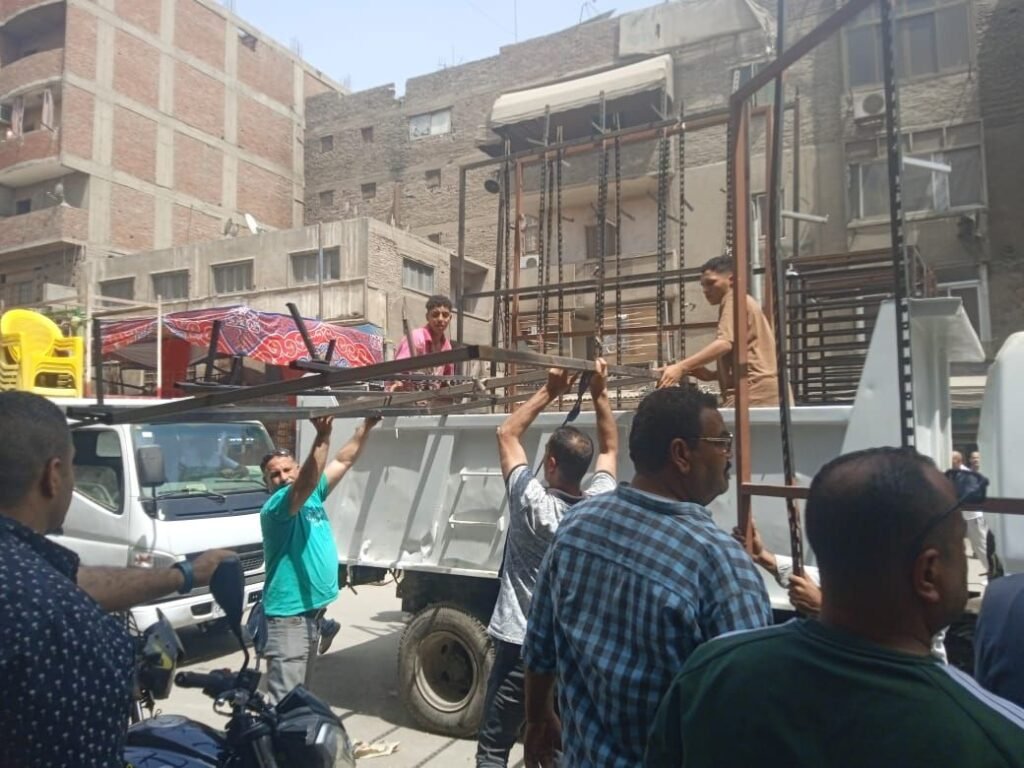 img-20260514-wa00858275635533487495315-1024x768 محافظة الجيزة تعيد الانضباط لشارع ناهيا ومحيط المزلقان بحي بولاق الدكرور