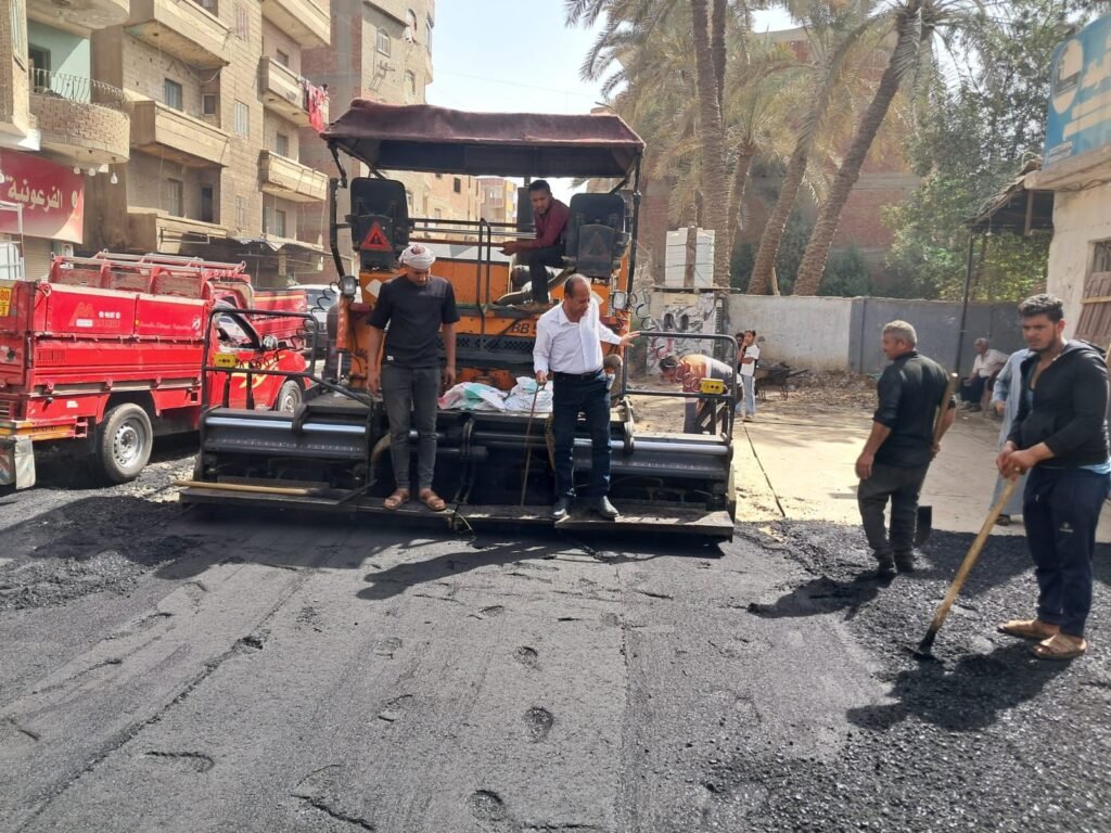 img-20260521-wa00081457389816699466049-1024x768 رئيس مدينة أبو النمرس بالجيزة يقف على تنفيذ رصف الطبقة الرابطة بشارع علي سلامة بالمنوات