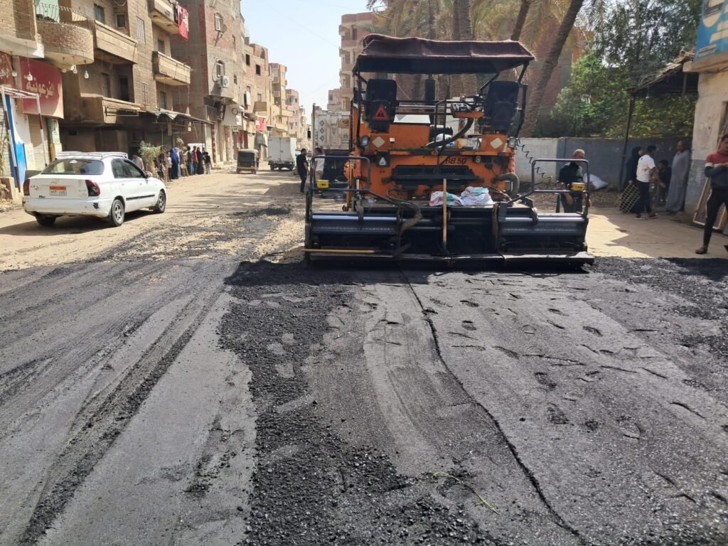 img-20260521-wa00114311441641249451009-1024x768 رئيس مدينة أبو النمرس بالجيزة يقف على تنفيذ رصف الطبقة الرابطة بشارع علي سلامة بالمنوات